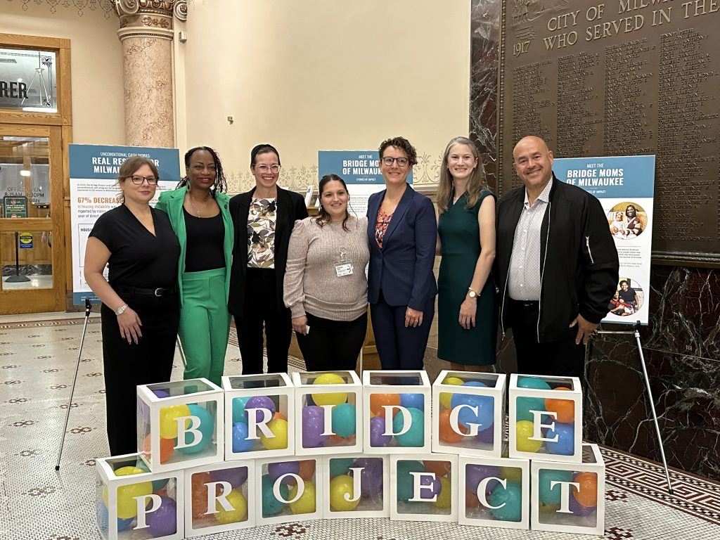 L to R: Danielle Rodriguez, director of the City of Milwaukee's Department of Administration. Alderwoman Sharlen Moore, 10th District. Lianna Bishop, Zilber Family Foundation executive director. Natasha Houle, Bridge Project intital cohort mother. Alderwoman Marina Dimitrijevic, 14th District. Suzanna Fritzberg, Bridge Project executive director. Alderman and Council President José G. Pérez, 12th District. Photo taken by Lauren Hafeman on Sep. 15. 