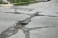 Potholes in Riverwest. Photo by Jeramey Jannene.