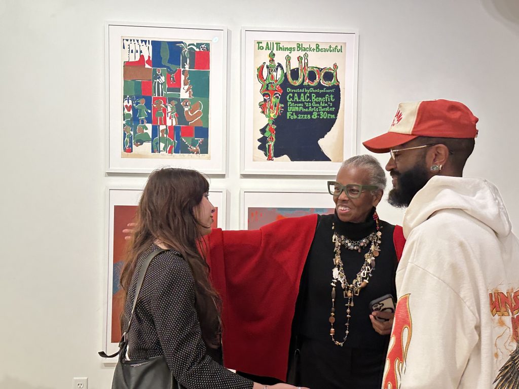 Artist Evelyn Terry with Exhibition Guests. Photo by Lauren Hafeman.