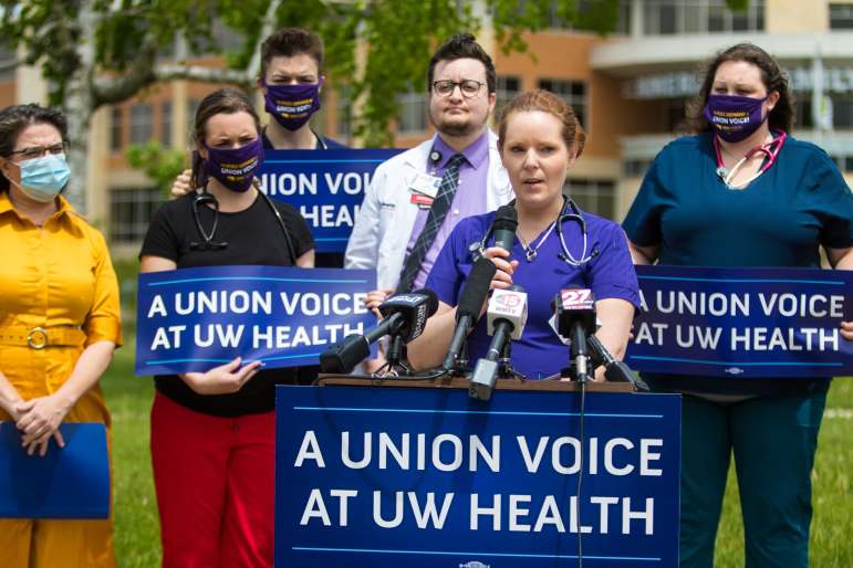 Registered nurse Tami Burns speaks during a May 2021 press conference calling on UW Health to recognize a nurses’ union. Around 2,500 nurses lost certification of their union in 2014 when their contract expired. Since then, UW Health has argued that Act 10 precludes the quasi-state health authority from signing a collective bargaining agreement with its workforce. (Courtesy of SEIU Healthcare Wisconsin)