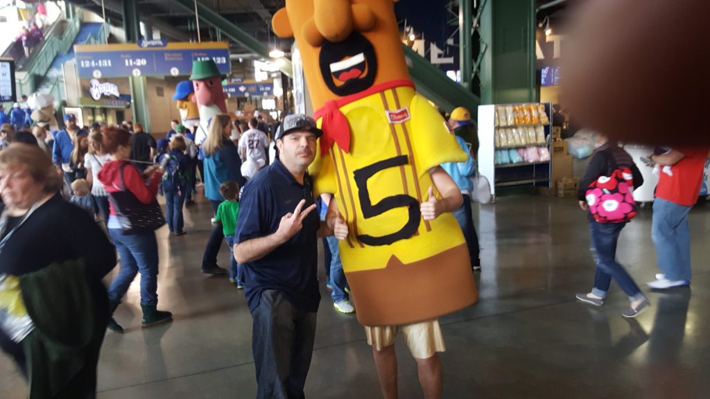 Arnold Peabody takes a photo with the racing Chorizo in the American Family Field concourse. (Photo provided by Arnold Peabody)