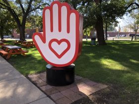 Jason Pickleman's Hand Heart at Catalano Square in 2021. Photo by Jeramey Jannene.