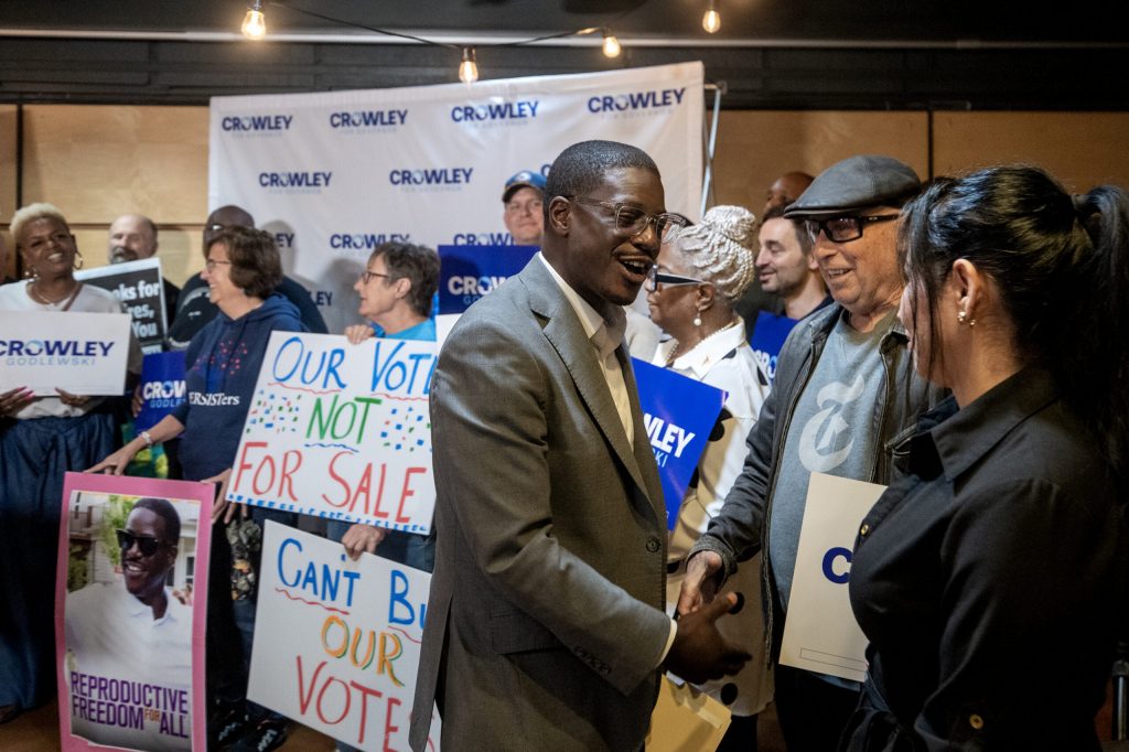 Wisconsin gubernatorial candidate Milwaukee County Executive David Crowley shakes hands as he enters a press conference Thursday, Oct. 1, 2026, at Milwaukee Public Market in Milwaukee, Wis. Angela Major/WPR