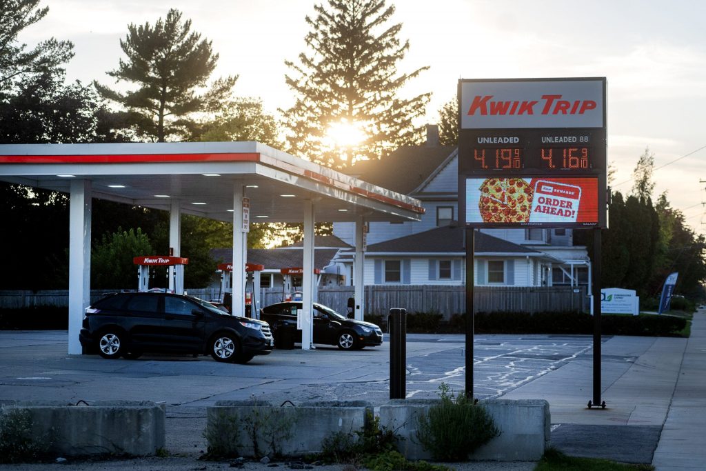 Customers pump gas Tuesday, Oct. 6, 2026, at a Kwik Trip in Stoughton, Wis. Angela Major/WPR