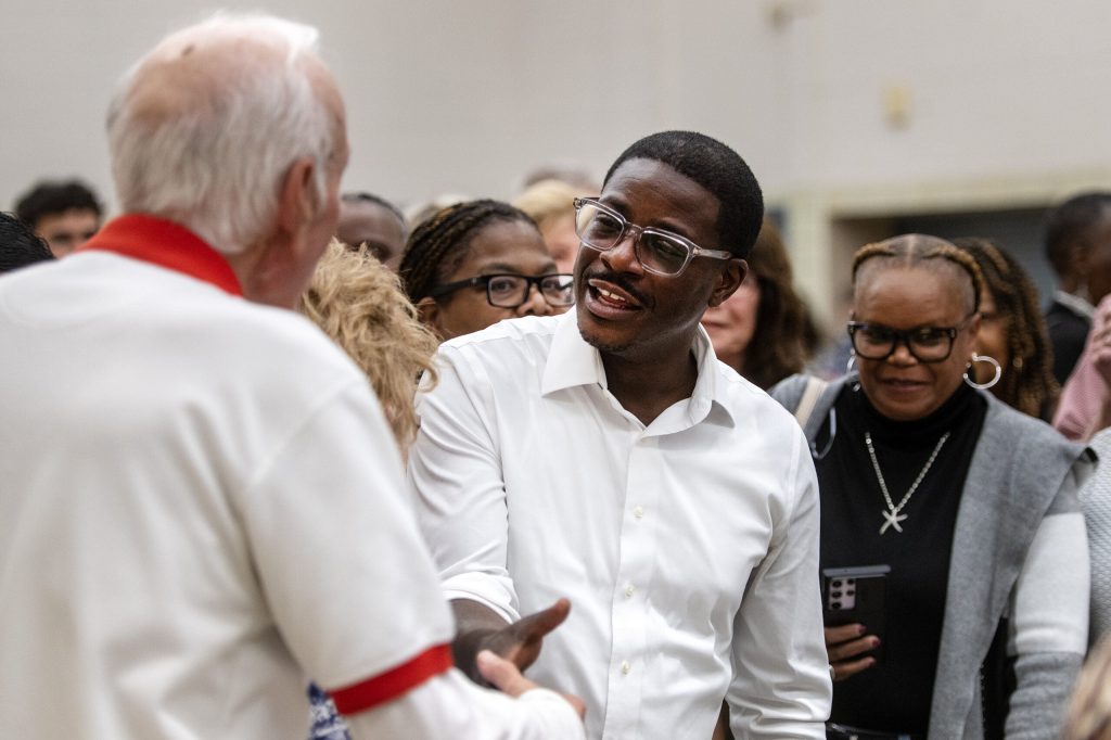 Milwaukee County Executive David Crowley shakes hands with attendees during a campaign event Friday, Oct. 9, 2026, at New Zion Baptist Church in Beloit, Wis. Angela Major/WPR