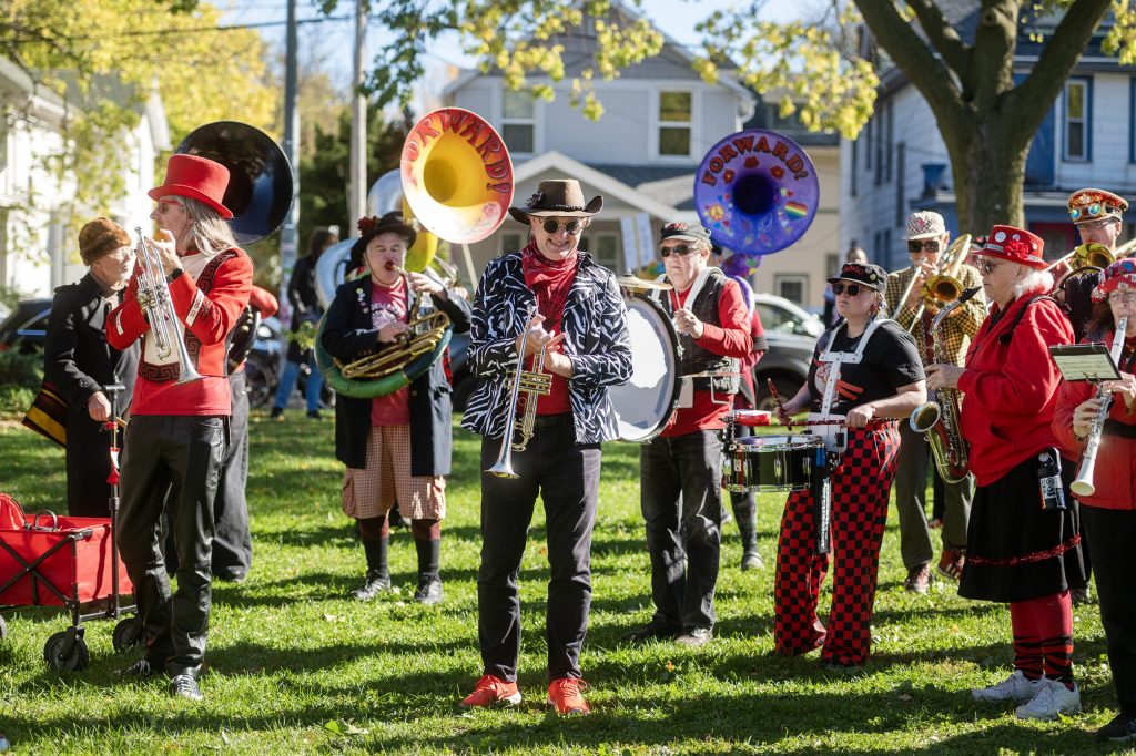 The Forward Marching Band performs protest songs as a No Kings protest begins Saturday, Oct. 17, 2026, at James Madison Park in Madison, Wis. Angela Major/WPR