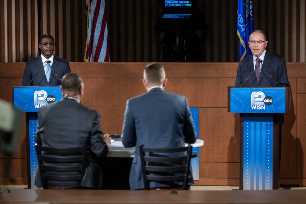 Milwaukee County Executive David Crowley, left, and U.S. Rep. Tom Tiffany, right, debate Wednesday, Oct. 21, 2026, at Marquette University Law School’s Eckstein Hall in Milwaukee, Wis. Angela Major/WPR