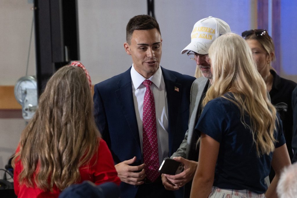 Michael Alfonso, a candidate for Wisconsin’s 7th Congressional District, attends a visit from President Donald Trump at Custer Farms in Chippewa Falls, Wis. on June 5, 2026. Angela Major/WPR