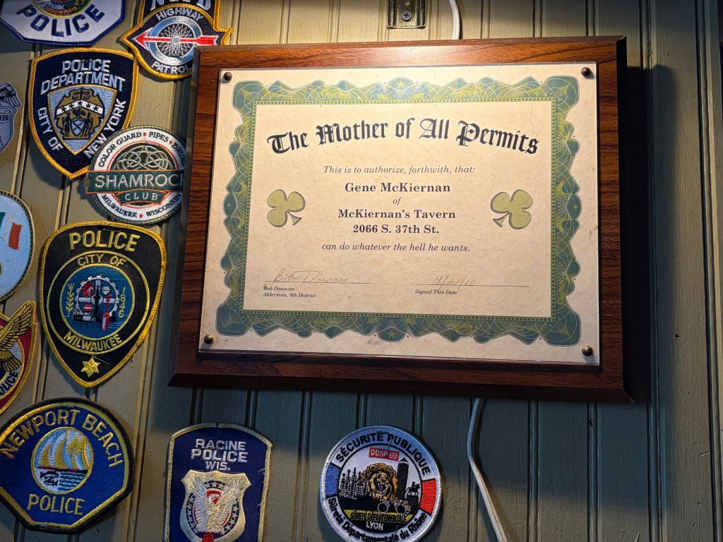 A plaque hangs in McKiernan’s Tavern in Milwaukee. The owner says Republican Bob Donovan helped the business get up and running when he was a Milwaukee alder in 2010. Corrine Hess/WPR