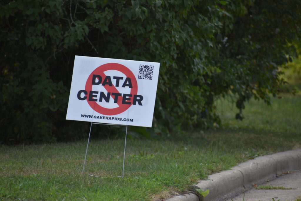 An anti-data center sign in the yard of a home in Wisconsin Rapids, WI. Avery Martinez/WPR