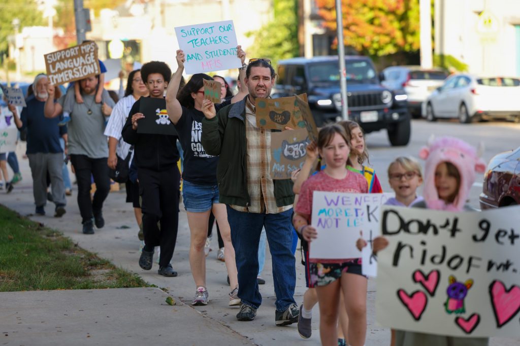 Parents, staff and students of the Milwaukee French Immersion School participate in a protest against staffing cuts. (Photo by Jonathan Aguilar / Milwaukee Neighborhood News Service / CatchLight Local)