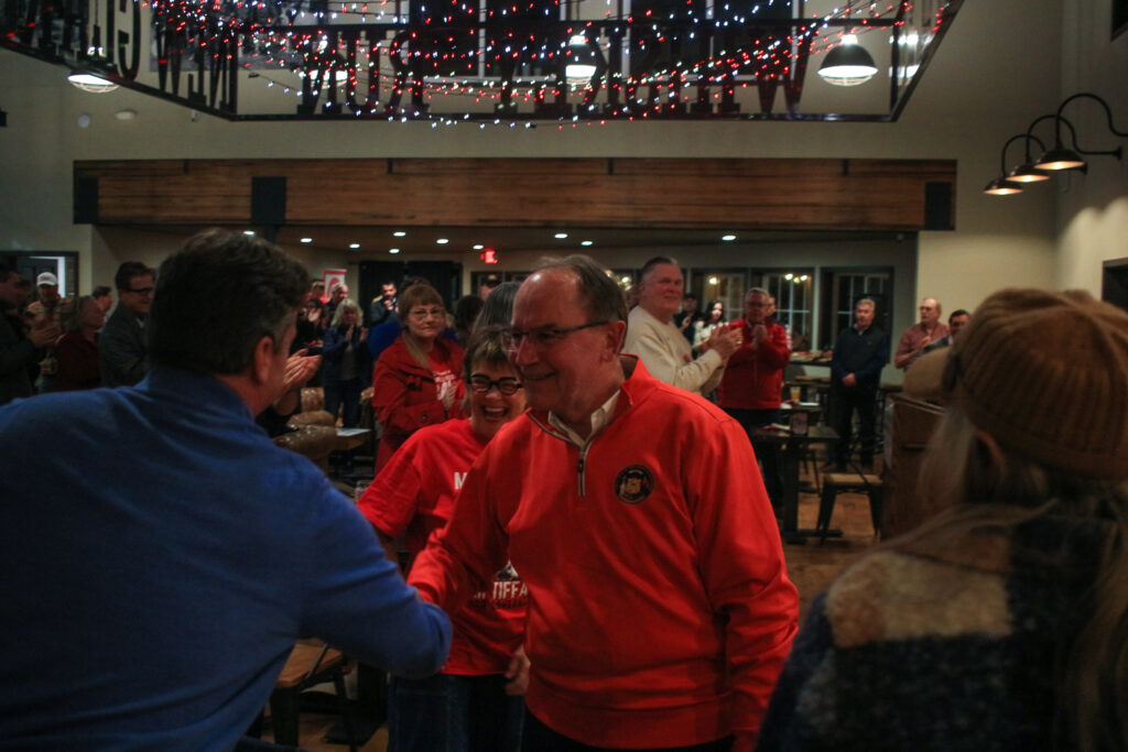 U.S. Rep. Tom Tiffany greets supporters after speaking at a campaign event Oct. 26 in New Glarus. (Photo by Henry Redman/Wisconsin Examiner)