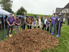 Aaron Werth, Joe Kaltenberg, Kevin Muhs, Kayla Schultz, Stella Schenider, Therese Schneider, Gayle Cluck, Jake Schneider, Robert Schneider, Cavalier Johnson at Stella's Playground groundbreaking. Photo by Jeramey Jannene.