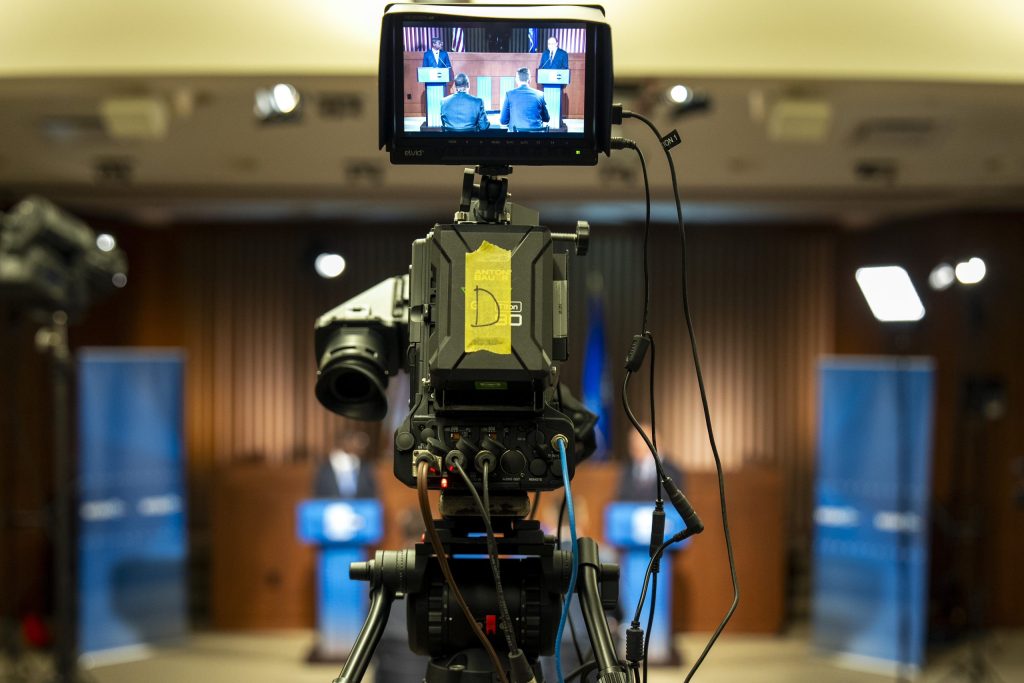Milwaukee County Executive David Crowley. left, and U.S. Rep. Tom Tiffany, R-Hazelhurst, appear at a gubernatorial debate at Marquette University Oct. 21, 2026. (Andy Manis for Wisconsin Watch)