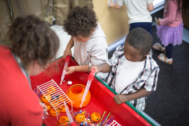Children in Madison College’s Early Learning Campus explore using a sensory table. Federal CCAMPIS funding supported roughly 120 Madison College students who completed their degrees since 2018. (Courtesy of Madison College)