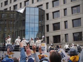 Team rallying the crowd. Far left: Jacob Misiorowski.Photo by Lauren Hafeman on Oct. 20, 2026.