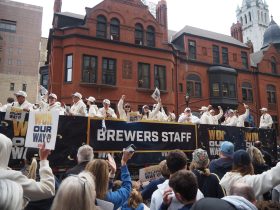 Brewers staff celebrating in the parade. Photo by Lauren Hafeman on Oct. 20, 2026.