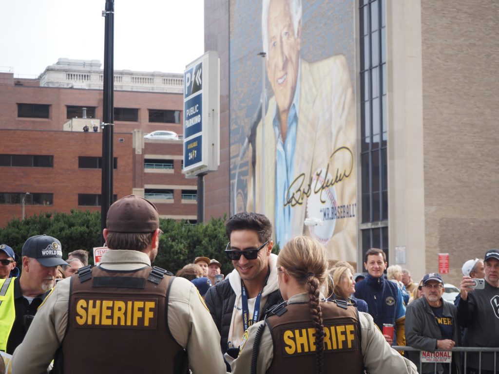 Ryan Braun passing the Bob Uecker mural, waving to fans. Photo by Lauren Hafeman on Oct. 20, 2026.