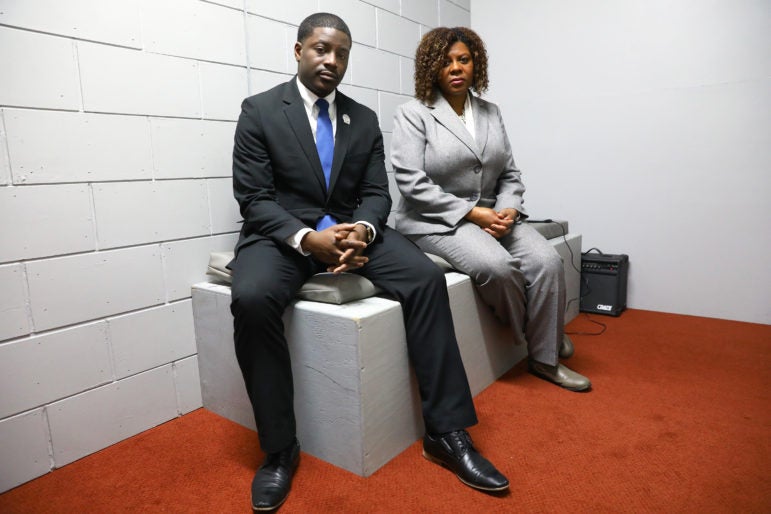 In this 2017 photo, state Rep. David Crowley and state Sen. LaTonya Johnson, both Democrats from Milwaukee, are seen in a life-sized mock solitary cell that was set up at the Wisconsin State Capitol. Coburn Dukehart/Wisconsin Center for Investigative Journalism