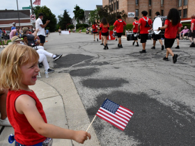 Flag Waver at 2024 Bay View 4th of July Parade