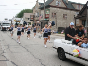 Priest and Cheerleaders