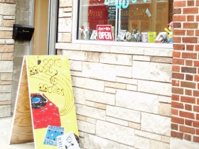 The sign Troka painted welcomes customers to the store, which is situated in the 1913 Brickyard Building.