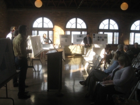 Residents listen to the presentation.