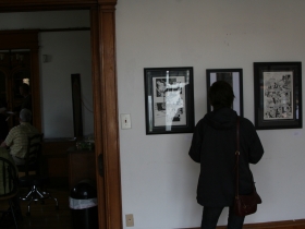 The artwork includes pieces by local comic book creator Matt Chic.