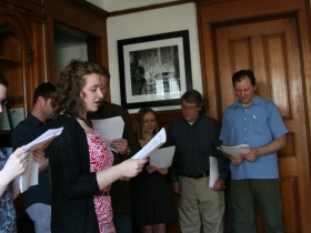 Reading from a comic book.