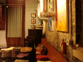 The back room where music plays and events are held.