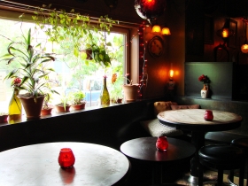 Window seating overlooking patio.