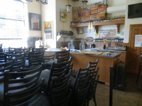 The Lakefront Brewery Tour Room, once a lively hive of activity, is now dead storage for barstools.