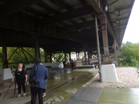 Preparing to take wedding photos under the Marsupial Bridge.