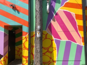 Mural painted on the alley side of Up-Down Milwaukee, 615 E. Brady St.