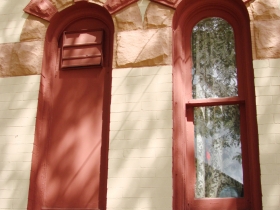 The windows were once all closed off like the one on the left now the majority of the windows are open and more welcoming.