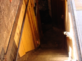 Trap door to basement and bowling alley.