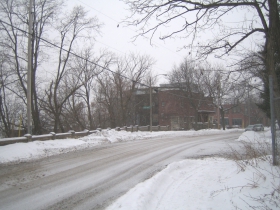 The Dixon Duplex as seen from the northeast on a snowy afternoon. It lies on one of the high points of Brewers' Hill.  The former