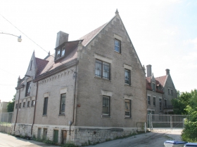 Carriage House at 3030 W. Highland Blvd.