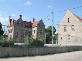 Carriage House at 3030 W. Highland Blvd.