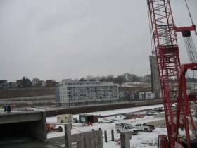Precast concrete panel being lifted into place