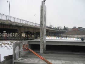 Precast concrete panel being lifted into place
