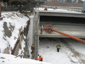 Precast concrete panel being lifted into place