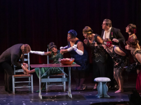 (L to R) Carlos Santelli as Prince Charming, Taylor-Alexis DuPont as Armelinde Pictordu (step-sister), Ardeen Pierre as Maguelonne Pictordu (step-sister), Zachary Crowle as Baron Pictordu (father) and The Florentine Opera Chorus