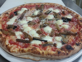 Carini's La Conca d'Oro: Parmigiana Pizza with eggplant and parmigiano reggiano