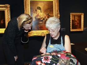 Joyce Krueger demonstrates Rug Hooking. Photo by Erol Reyal