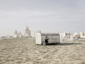 Migrant workers build luxury mausoleums for families of new-rich at Koshkar Ata -ancient City of the Dead. Aqtau, Kazakhstan, 2012