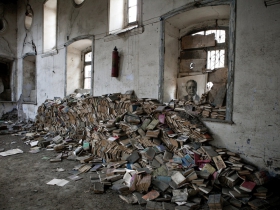 Soviet era books are collected to trash in a former library in Quba. The alphabet in the country was changed from Cyrillic to Turkish after the independence and history of the country is now being re-writen, thus most of Soviet books became not needed. Azerbaijan. 2011
