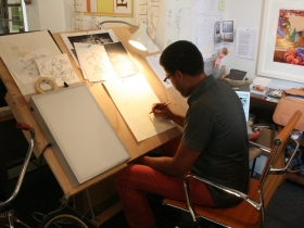 Reginald Baylor Working on a Painting
