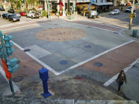 The intersection of Broadway and E. Saint Paul Ave. seen from Cafe Benelux.