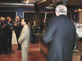 The mayor looks on as Ed Fallone addresses the crowd at his fundraiser.